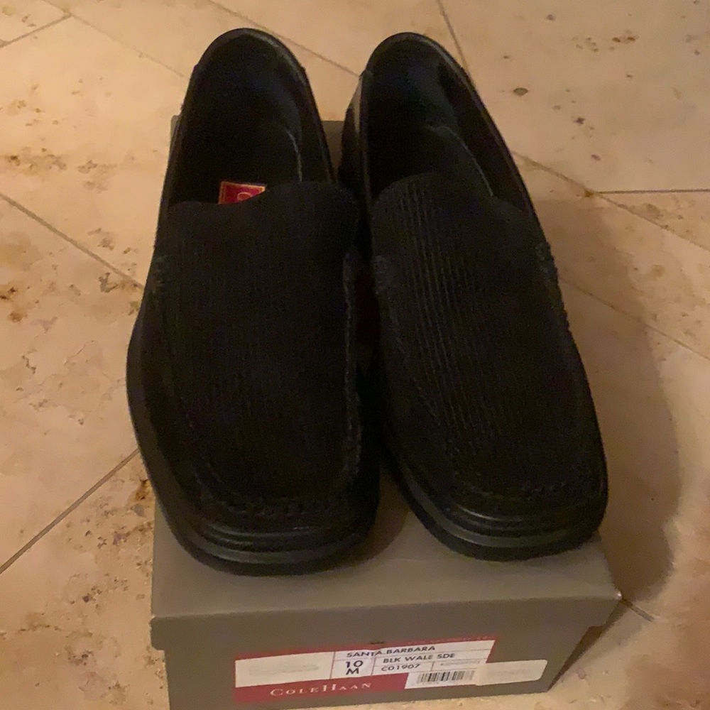 Black ribbed slip on Colehaan men’s shoes size 10